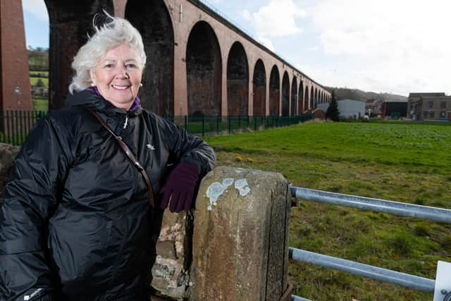 Podcaster Jean Lord under the Whalley Arches on Ridding Lane. Photo: Kelvin Stuttard