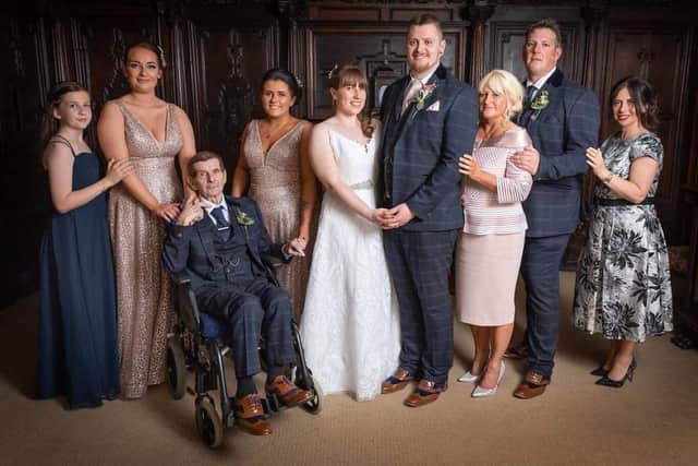 Charlie Glynn, in the wheelchair, with members of his family in Blackpool