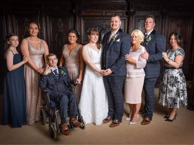 Charlie Glynn, in the wheelchair, with members of his family in Blackpool