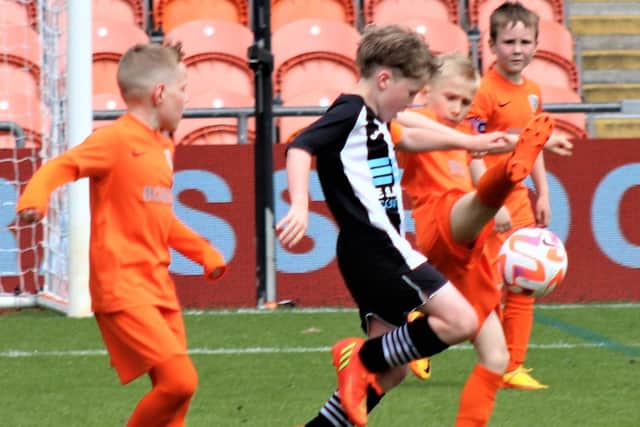 Hogan Plate action between Wyre Junior Blacks Under-9s and West Coast Sports Jets