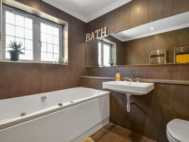 This is Rathgar. A four bedroom home in Portsdown Hill Road, Bedhampton, that is on sale for £1.19m. It is listed by Fine and Country.