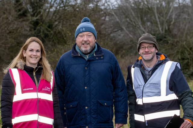 Great Salterns event director Kev Budd, centre, and volunteers Lou Griffin, left, and Ian Gregory Picture: Alex Shute