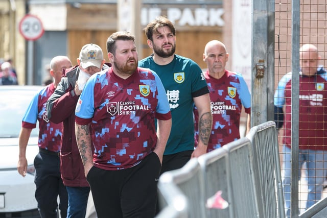 Burnley fans arrive at Turf Moor ahead of the Lancashire Derby with Blackpool. Photo: Kelvin Stuttard