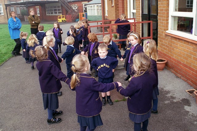 Youngsters at Elmslie Girls School enjoying some fresh air outside back in 2000