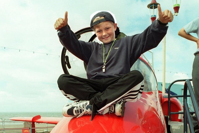 An RAF display on Blackpool promenade. Right year old Calum Graham on a Hawk Trainer in 1997
