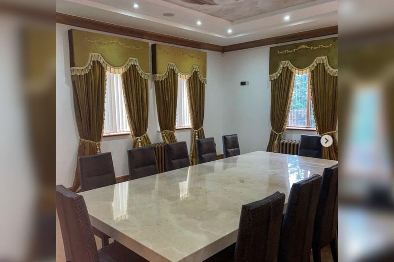 The custom made dining table contains stone made in Florence from the Adriana range at Stone International, supplied from Furniture Village