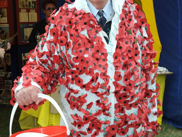 Spencer Leader in a poppy suit he donned several years ago to collect for the Poppy Appeal