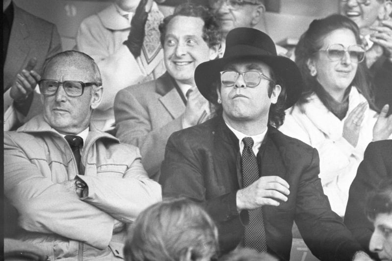 Elton John sat in the Blackpool directors stand during the Keith Mercer testimonial match between Blackpool and Watford