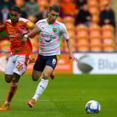 Brannagan opted to remain with Oxford, agreeing a new three-year deal