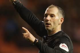 Referee Tim Robinson ignored Blackpool's late penalty appeals