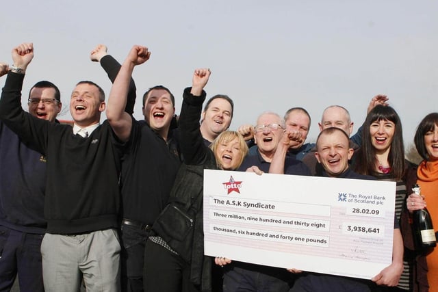 Members of staff from A.S.K. Rewinds Ltd in Accrington celebrate winning £3,938,641 in March 2009