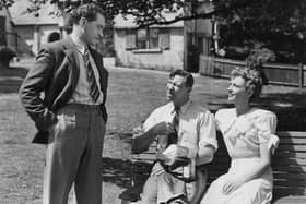 George Formby and Rosalyn Boulter (both seated) starred in the Columbia comedy 'George In Civvy Street'