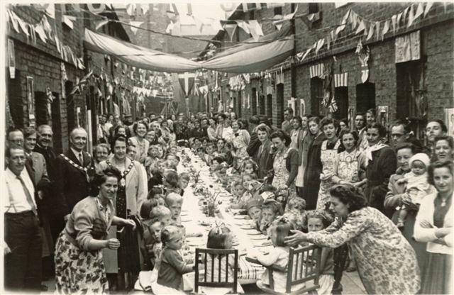 Flag Street lived up to it's reputation in 1953 when a street party was held to celebrate the Coronation of Queen Elizabeth II. Sadly Flag Street has since been levelled and is now part of the Albert Street car park