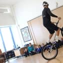 Danny Butler performing tricks for Gateway pupils
