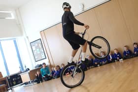 Danny Butler performing tricks for Gateway pupils