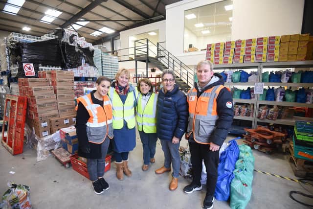 Chairman Neil Reid with members of the team at Blackpool Food Bank