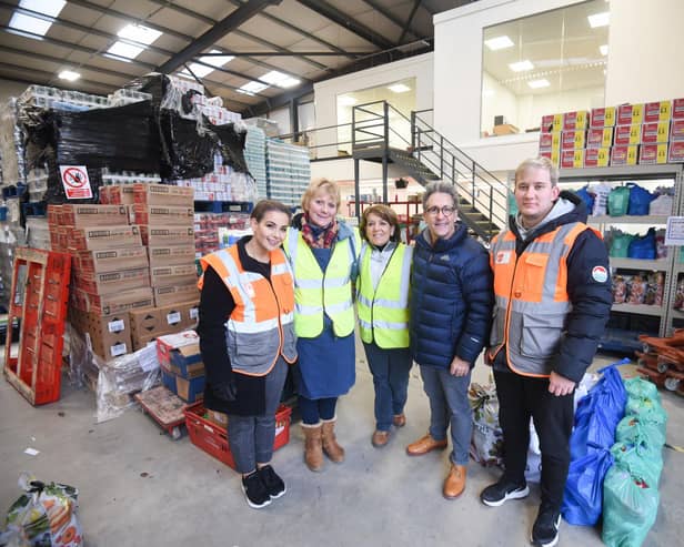 Chairman Neil Reid with members of the team at Blackpool Food Bank