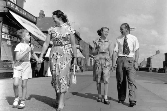 Blackpool Football Club player Stanley Matthews with his wife and children in Blackpool
