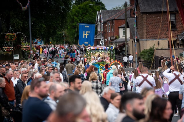 A busy seen as the morning procession passes through the streets at Freckleton Club Day.