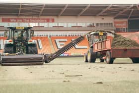 Work has begun on the pitch at Bloomfield Road (Credit: Blackpool FC)