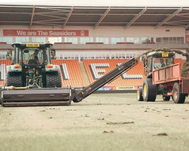 Work has begun on the pitch at Bloomfield Road (Credit: Blackpool FC)