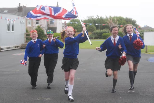 Pupils at Gateway Academy have been celebrating the Queen's Jubilee. Here Pupils from Year 6 fly the flag for Britain.