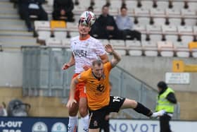 Elkan Baggott is sidelined with an ankle injury. The on-loan defender could return to action with Blackpool later this month. (Image: Camera Sport)