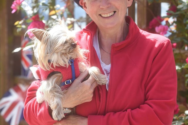 Carol Lee with her little dog Shadow at the Stanley Park dog club jubilee party.