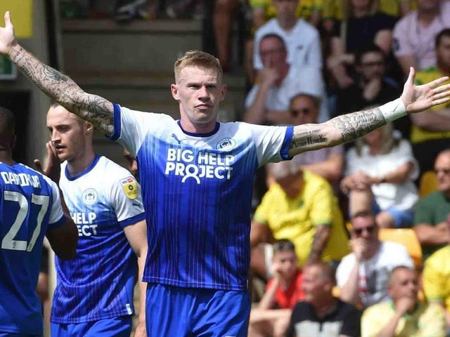 James McClean celebrates opening the scoring for Wigan Athletic against Norwich City at Carrow Road