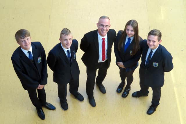 Fleetwood High School on Broadway has been classed as 'Good' by Ofsted. Pictured: headteacher Richard Barnes with pupils.