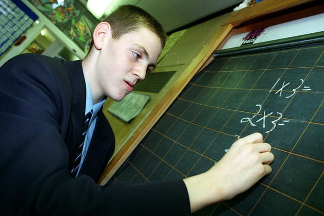 Pupils at Collegiate School were being paid to tutor youngsters at Layton Primary School as part of a scheme pioneered in America.
Photo shows Richard Mineur, who was 13, giving his tutor group a maths test