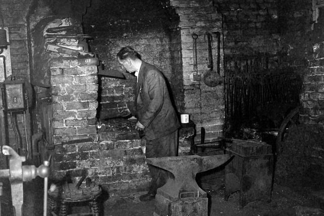 This is from a glass plate negative and shows Mr Hedley Wood who was a blacksmith at Marsh Mill smithy in Thornton, 1964