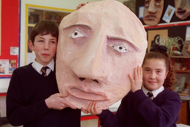 Matthew Johnstone and Charlene Pelzer, both 13, with a giant mask in 1997