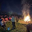 Blackpool Scouts singing around the campfire.