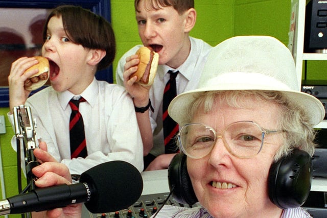 Unit Manager Ann Fiddies announced the day's menu on Radio Warbreck, while Station Manager Chris Houghton (right) and DJ Alex Hutchinson tuck into their sausage butties, 1999