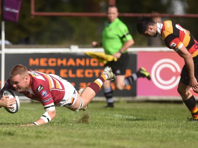 Fylde's Toby Harrison scores one of their tries in Saturday's victory over Harrogate Picture: Daniel Martino