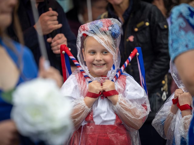 Rain did not affect this young lady's happy demeanor