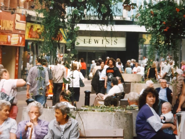This is a lively, bustling, middle of the summer scene in Blackpool's Bank Hey Street in the 90s