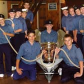 Fleetwood Sea Cadets - winners of the National Junior Boat-Pulling Competition. Pictured kneeling are three of the members of the winning team. From left: Kris Phillips, Sinead Scott, and Stephen Watt. The other two team members (not pictured) were Jonathan Holding and Jak Blundell