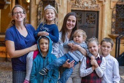 Katrina Lee (L) host with Olena Datsenko (guest) and families