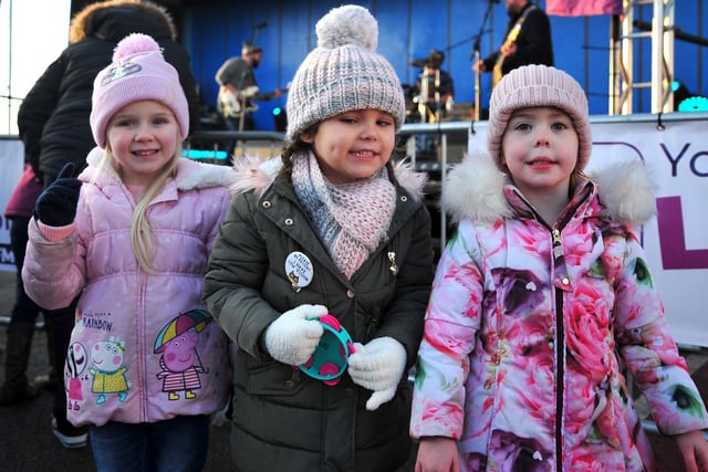 From left, Lola Moore, four, Layla Rhodes, four, and Perry Gordon, four, at the Morecambe Christmas lights switch- in 2019