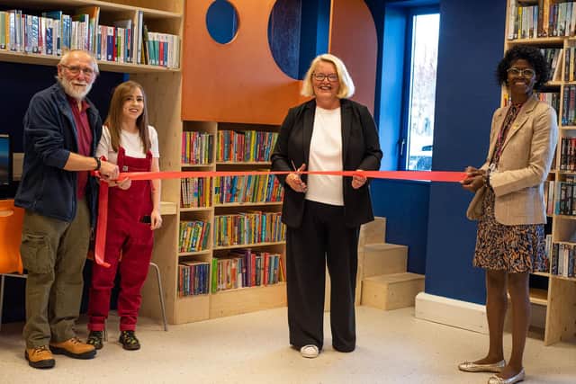 Blackpool Council leader Coun Lynn Williams cuts the ribbon to officially open the new Langdale Library and Laundry Room, watched by (from left) Coun Adrian Hutton of Clifton ward, Langdale Library manager Lois Duxbury and Coun Paula Burdess of Clifton ward.