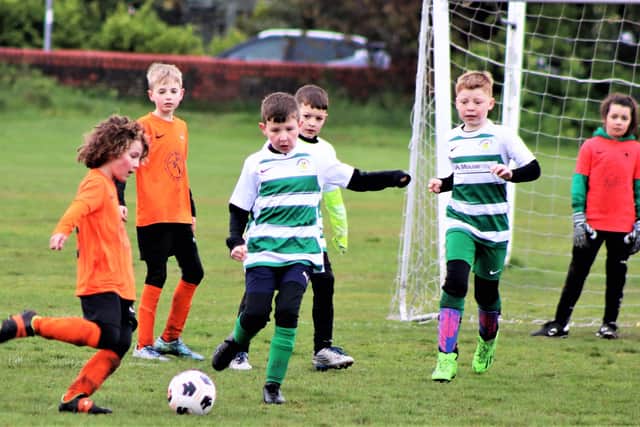 Action from our under-nines' match of the week between YMCA Whites and Foxhall Sporting  Pictures: B&DYFL