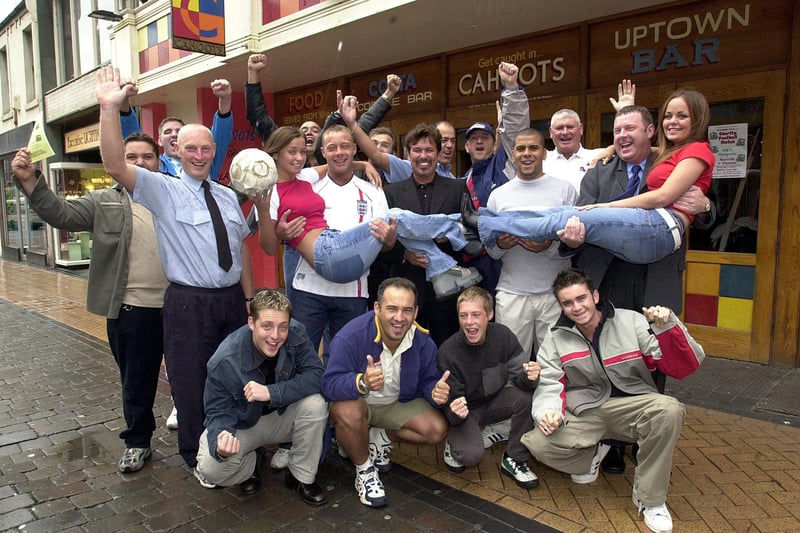 Charity football team members outside Cahoots in 2001