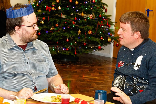 Rev Graham Young (right) with a member of the Cleveleys community during the Christmas lunch at Manor Beach