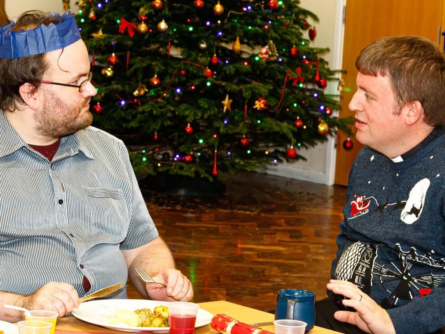 Rev Graham Young (right) with a member of the Cleveleys community during the Christmas lunch at Manor Beach