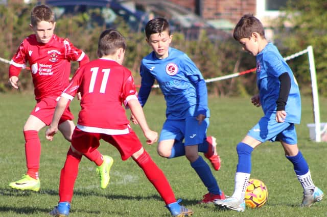 Thornton Cleveleys Lions and Fleetwood Town Junior Reds will play in the Easter tournament at Bispham JFF Picture: Karen Tebbutt