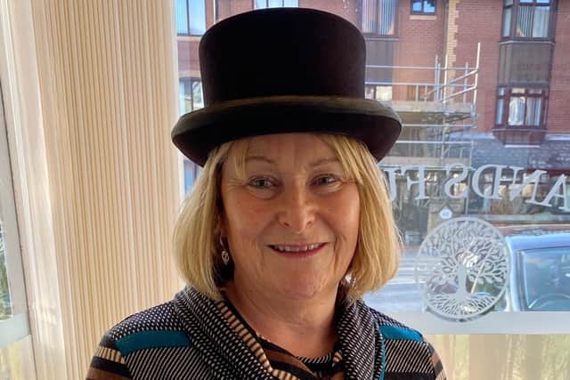 Julie Brady, from Lytham St Annes, hopes to raise awareness and fund research to find a cure for brain tumours after losing her mum to the disease. She is taking part in Wear A Hat Day for the charity Brain Tumour Research on Friday, March 31.