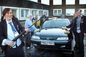 Julie Simkiss )(left) and managers from Hesketh House washing cars to raise money for Children In Need in 2005