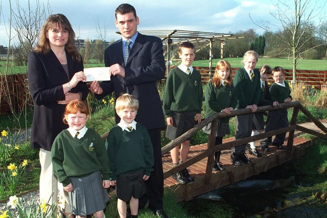 McDonald's presented Lytham CE School with a cheque for £200 towards their conservation area. Picture shows deputy head and conservation area co-ordinator Nicola Harrison receiving the cheque from restaurant manager Jez Freeman, with pupils(from left to right): Alicia Galloway (five), Andrew Murdoch (six), Adam Stewart (11), Emma Barrowclough (nine), Hannah Miles (10), Elizabeth Brownsword (six), and Jamie Briers (seven)